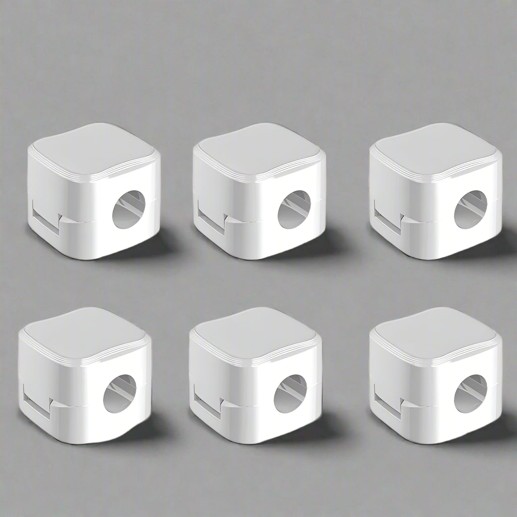 Set of 6 white cable clip holders organizing and securing charging cables on desk for clutter-free workspace