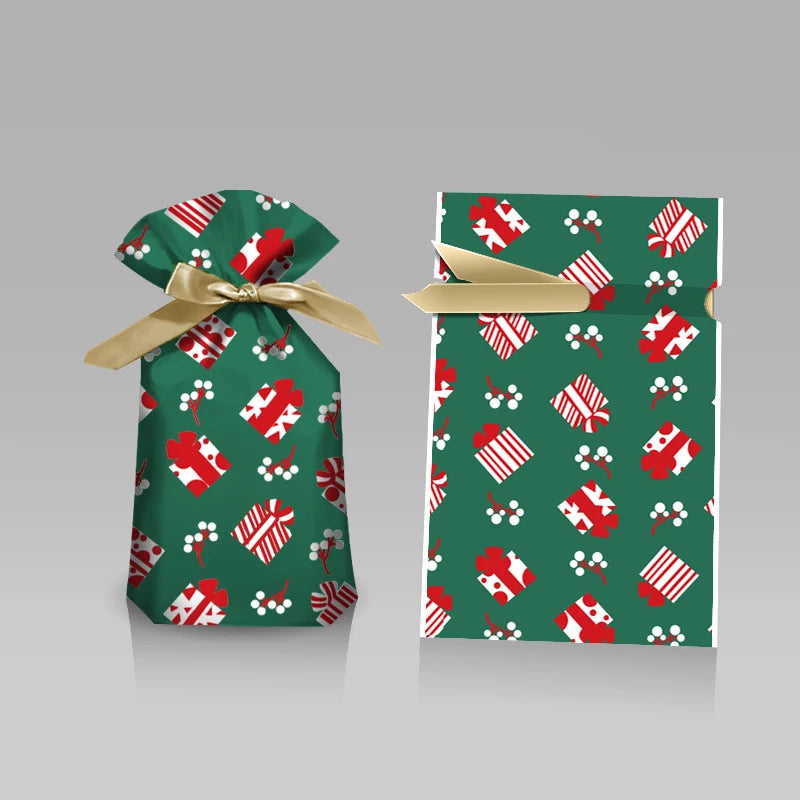 Two green gift bags with red and white patterns and gold ribbons on a gray background