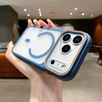 Phone case with a smiley face design held by a hand in an indoor setting