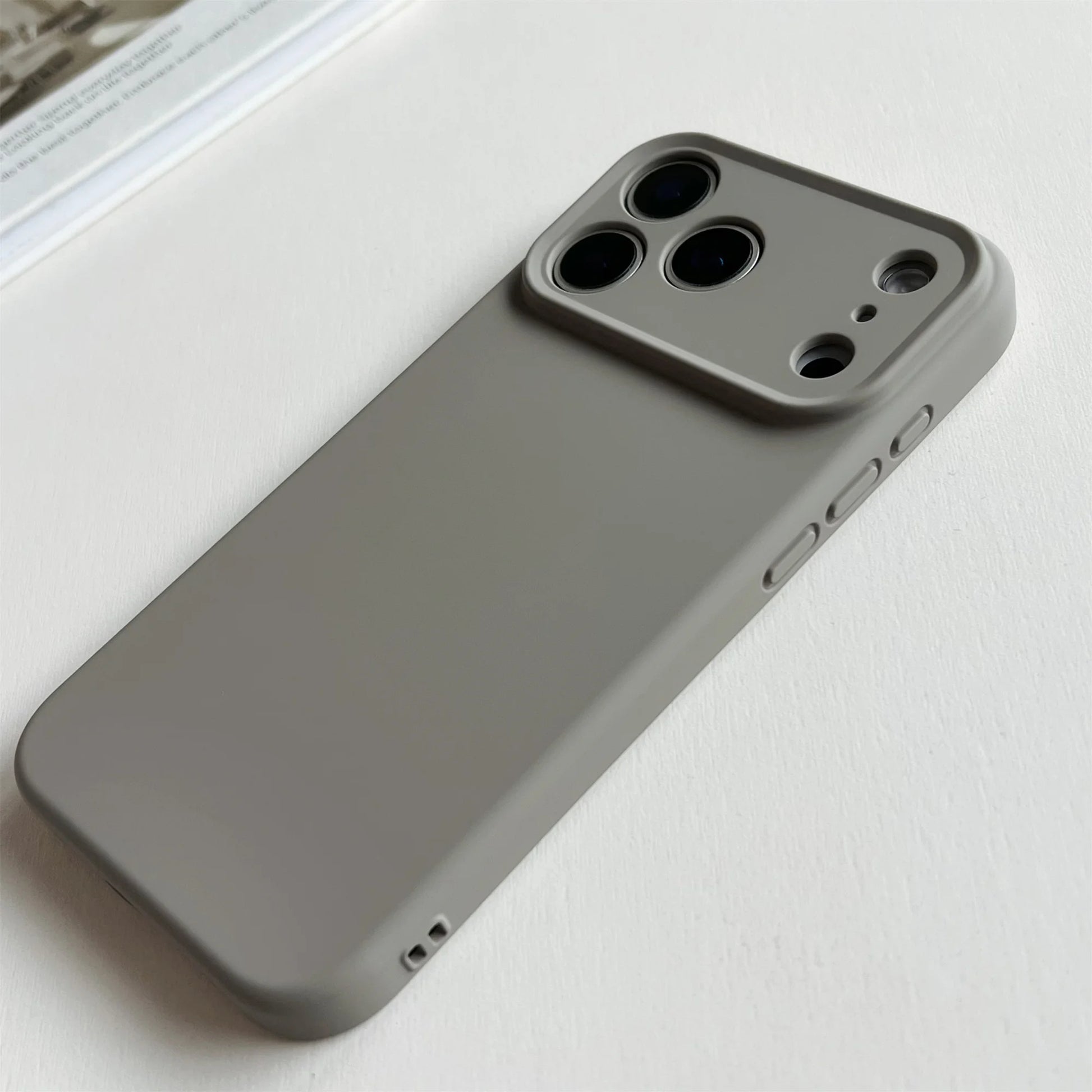 Gray phone case on a white surface