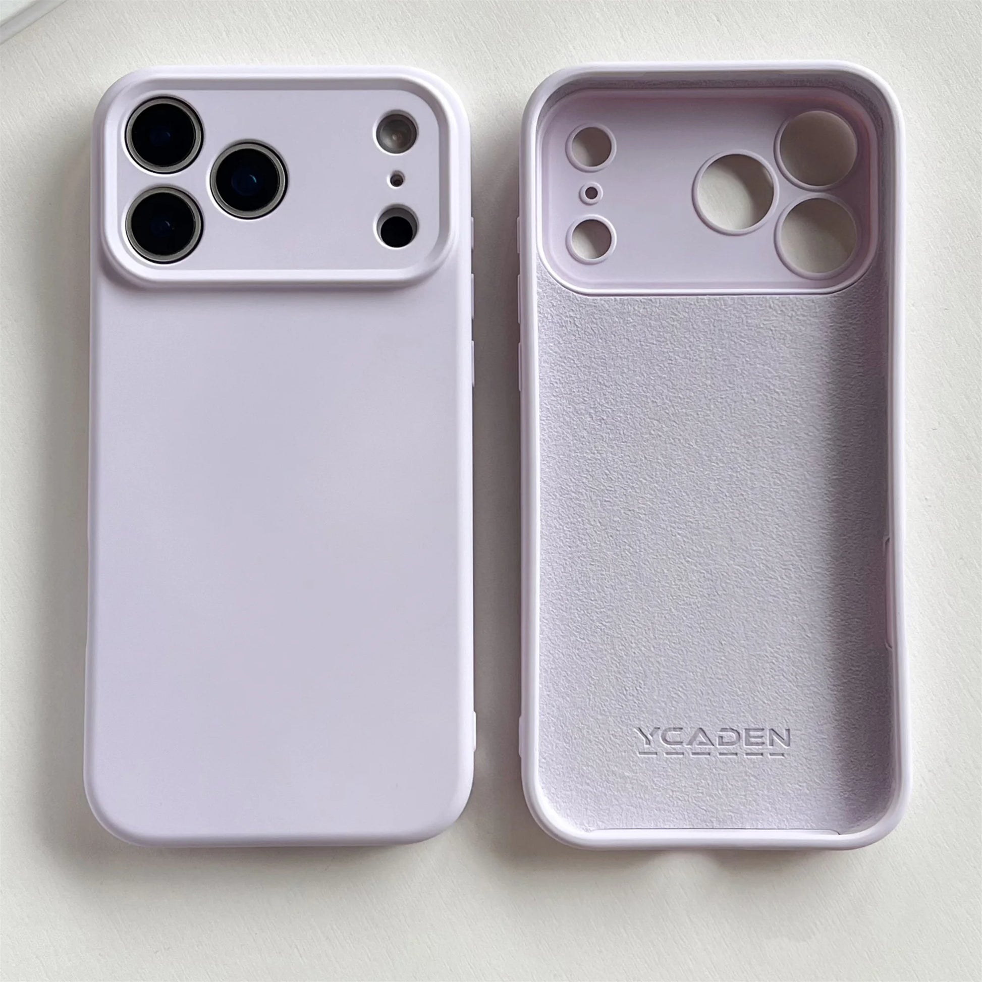 Phone case with 'YCADEN' branding on a light background