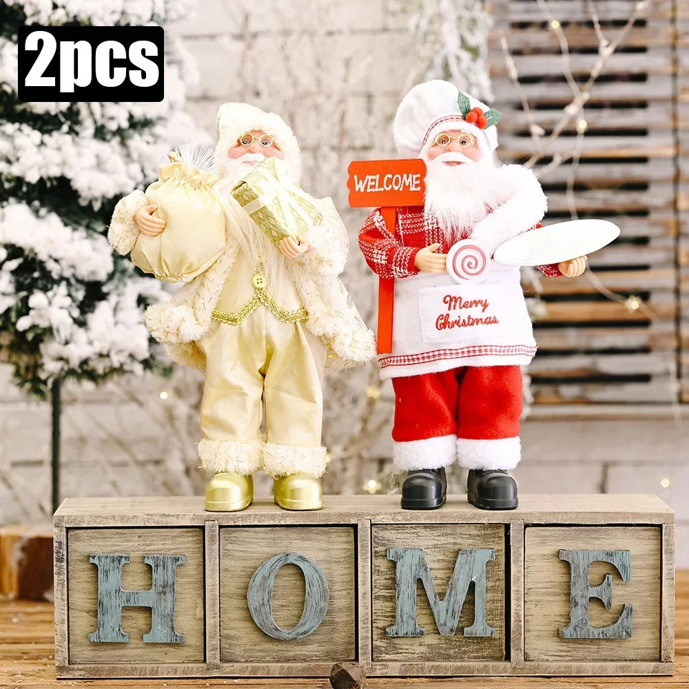 Two Christmas-themed figurines on wooden blocks with 'HOME' letters, decorative background.