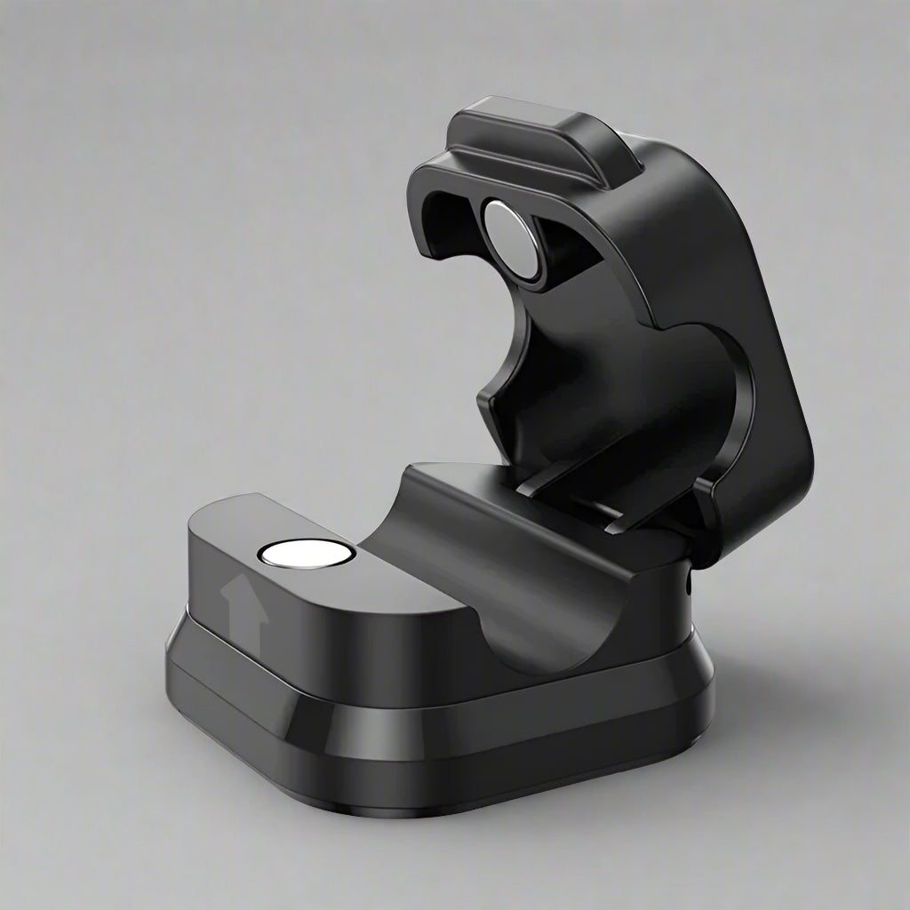 Black cable clip holder securing multiple charging cables neatly on desk for organized workspace