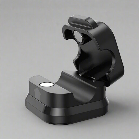 Black cable clip holder securing multiple charging cables neatly on desk for organized workspace