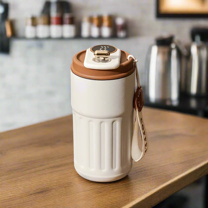 Brown Thermos 40oz stainless steel bottle with matte finish and ergonomic handle for hot and cold drinks
