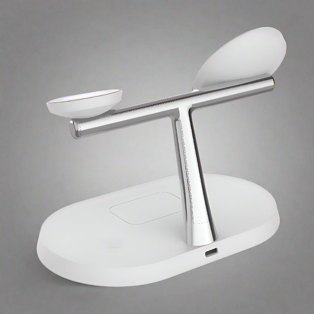 Apple charging station charging iPhone, Apple Watch, and AirPods simultaneously on desk
