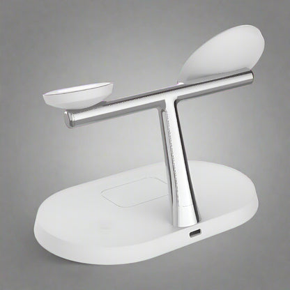 Apple charging station charging iPhone, Apple Watch, and AirPods simultaneously on desk
