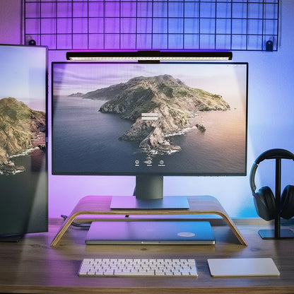LED monitor light bar with RGB backlight mounted on a computer monitor in a modern workspace