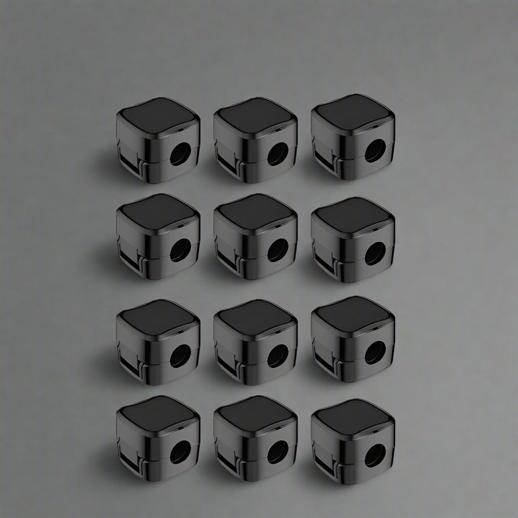 Multi-color cable clip holders keeping charging cables organized and tangle-free on wooden desk