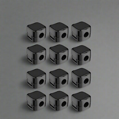 Multi-color cable clip holders keeping charging cables organized and tangle-free on wooden desk