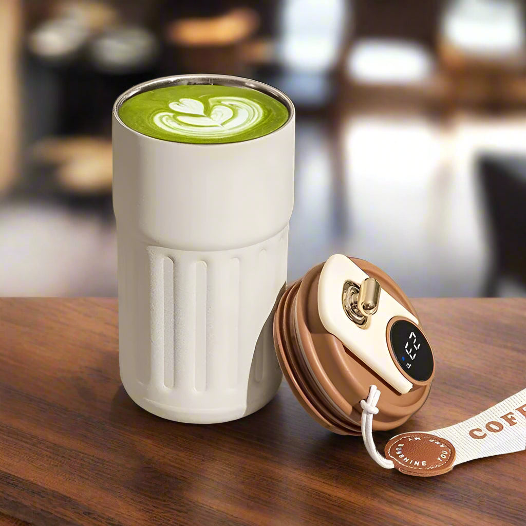 Thermos 40oz stainless steel bottle with matte finish and ergonomic handle for hot and cold beverages