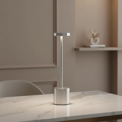 silver desk lamp standing on the living room desk